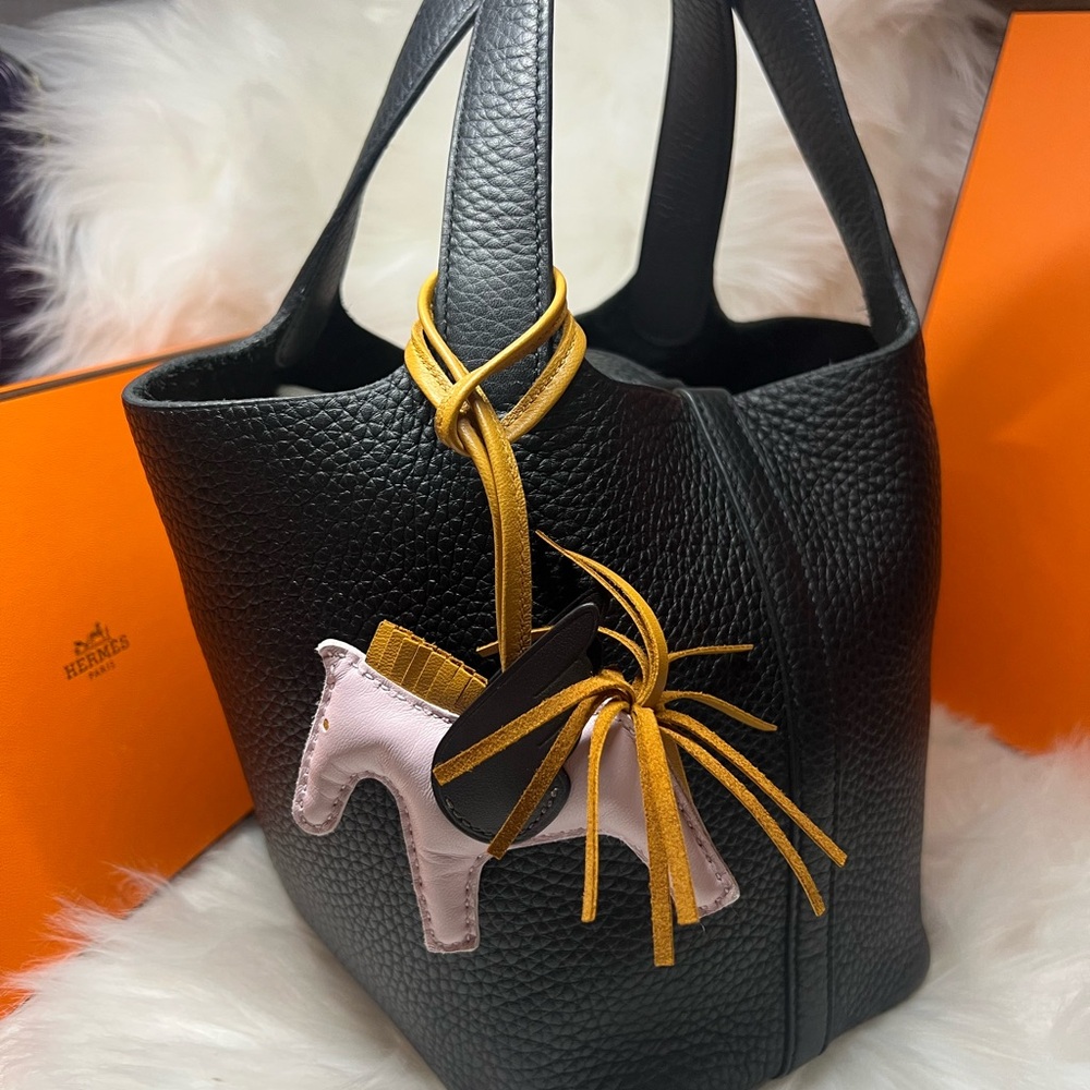 Hermès "Mauve Pale, Sesame, Ebene Milo and Swift Rodeo Pegase Charm PM, 2023